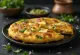 Paneer chilla palačinka s povrćem i sirom na tanjuru
